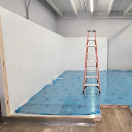 Projects 12 Empty room with ladder and flooring